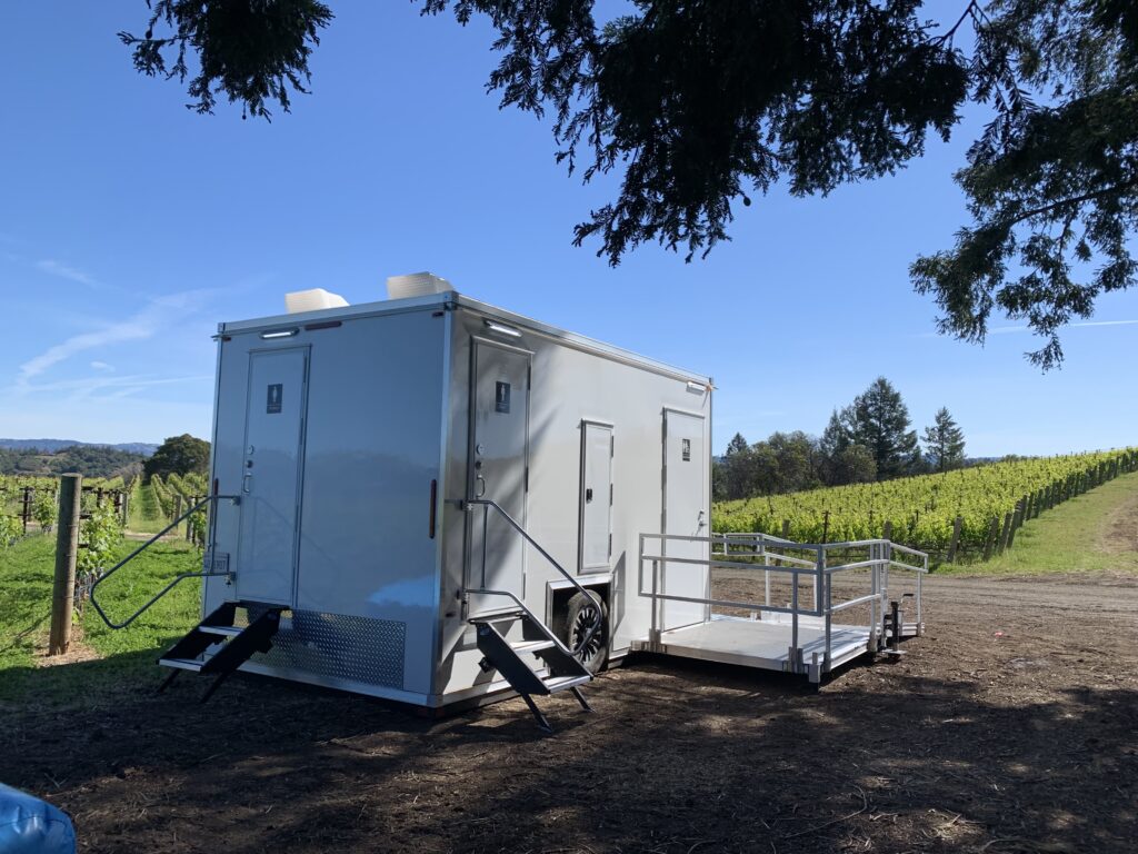 ADA 2-Stall Luxury Restroom Trailer Outside Vinyard View | The Lavatory Nor Cal
