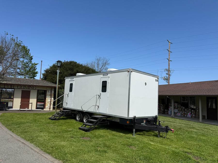 9-stall restroom trailer on the lawn at the Monterey fairgrounds, The Lavatory NorCal