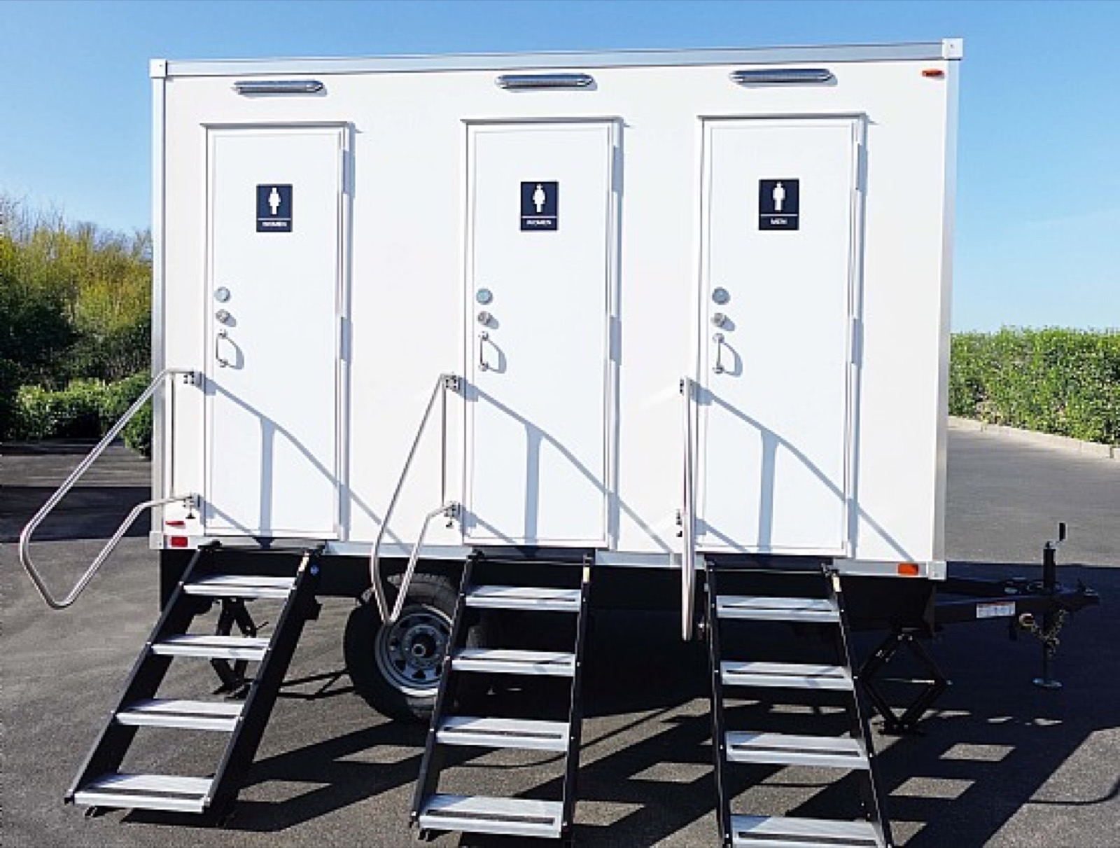 3-stall temporary bathroom trailer with three private doors and its own set of stairs at each door, The Lavatory NorCal