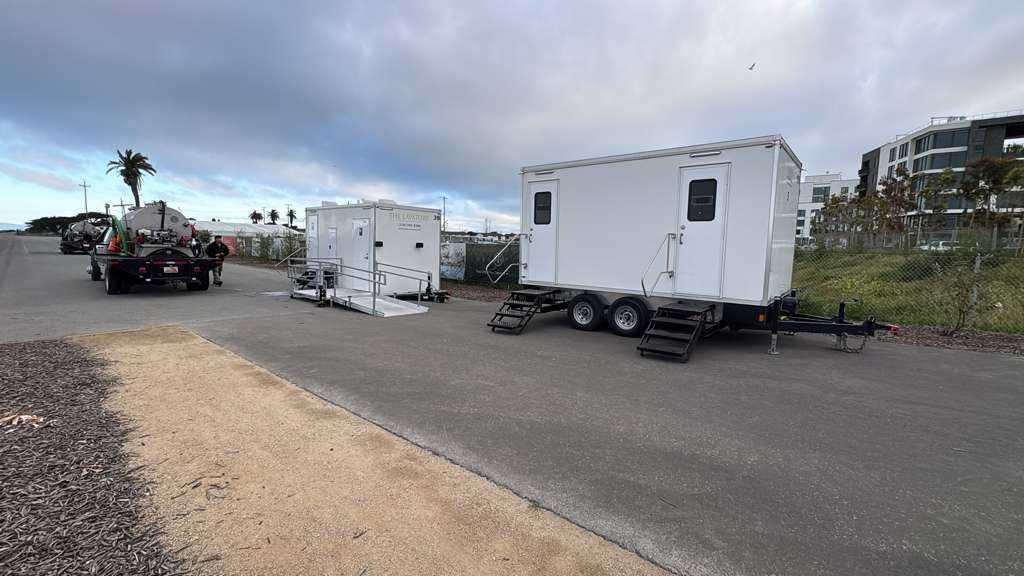 ADA restroom trailer with a ramp next to a second bathroom trailer on Treasure Island in San Francisco, The Lavatory NorCal