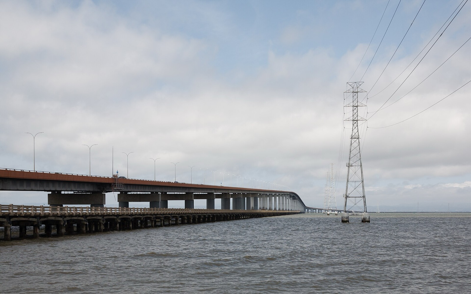 The San Mateo Bridge stretching west from the Hayward shoreline over the bay, an area served by The Lavatory NorCal