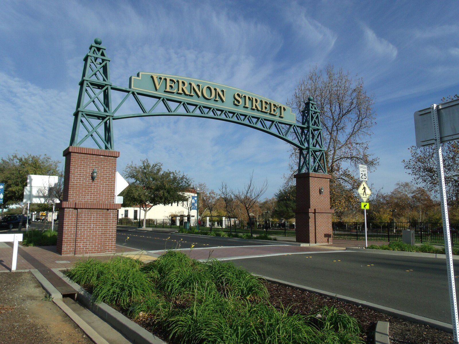 Green steel arch over Vernon Street in downtown Roseville, an area The Lavatory NorCal serves