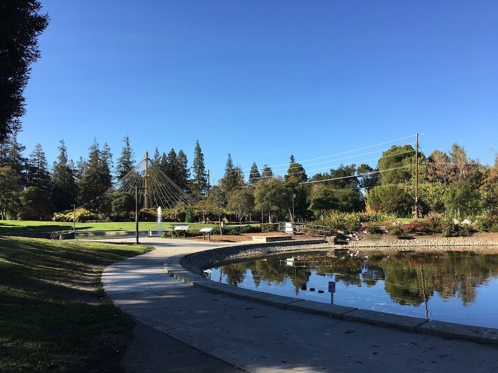 Pond and walking path in Central Park on Kiely Boulevard in Santa Clara, served by The Lavatory NorCal