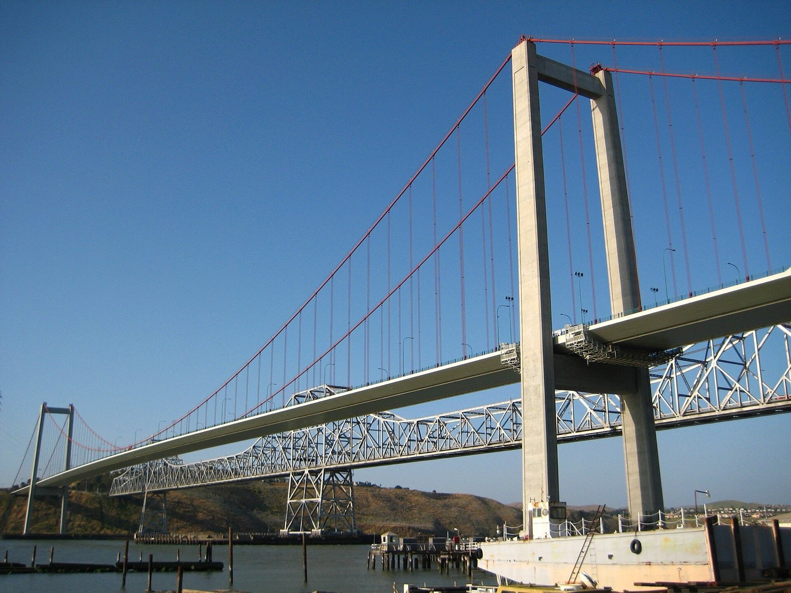 Carquinez Bridge over the strait at Vallejo with green hills behind, on our delivery route, The Lavatory NorCal