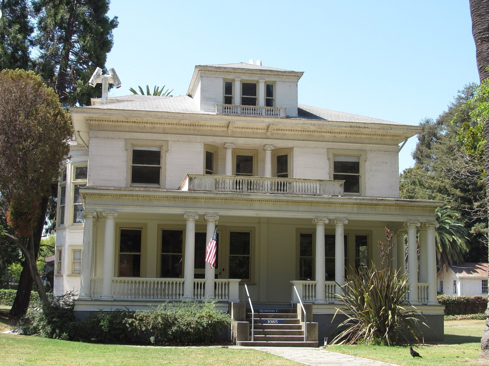 Historic officers' home with a long front porch on Mare Island in Vallejo, an area we serve, The Lavatory NorCal