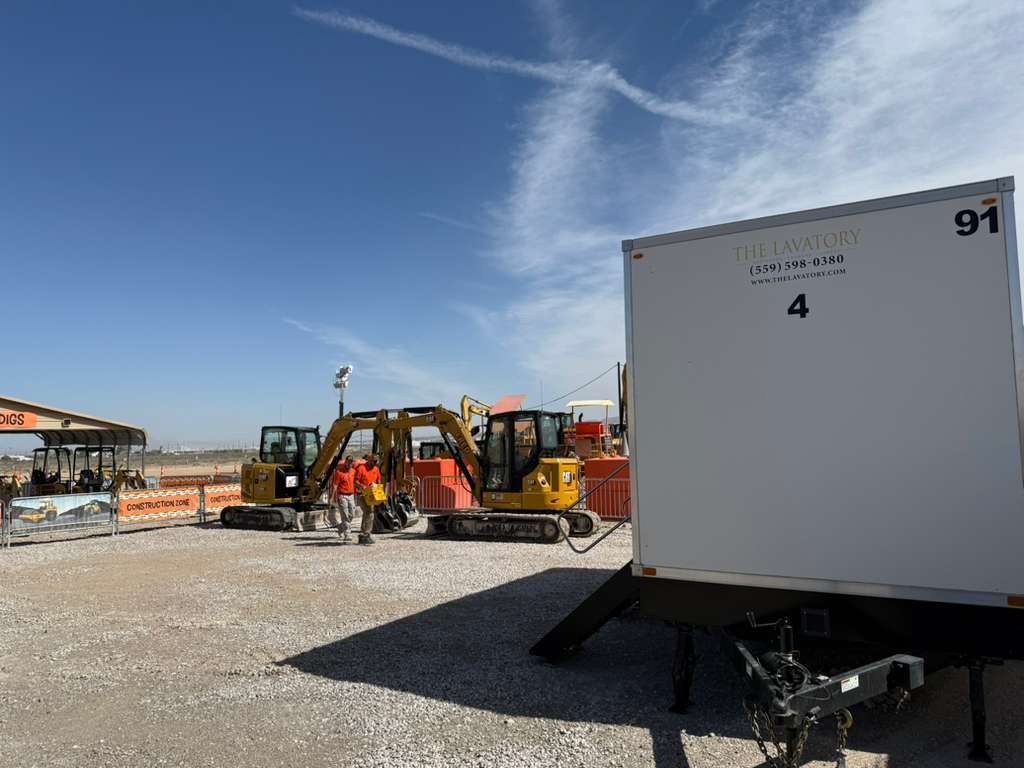 Lavatory 4-Station Restroom Trailer on site at Kids Digs
